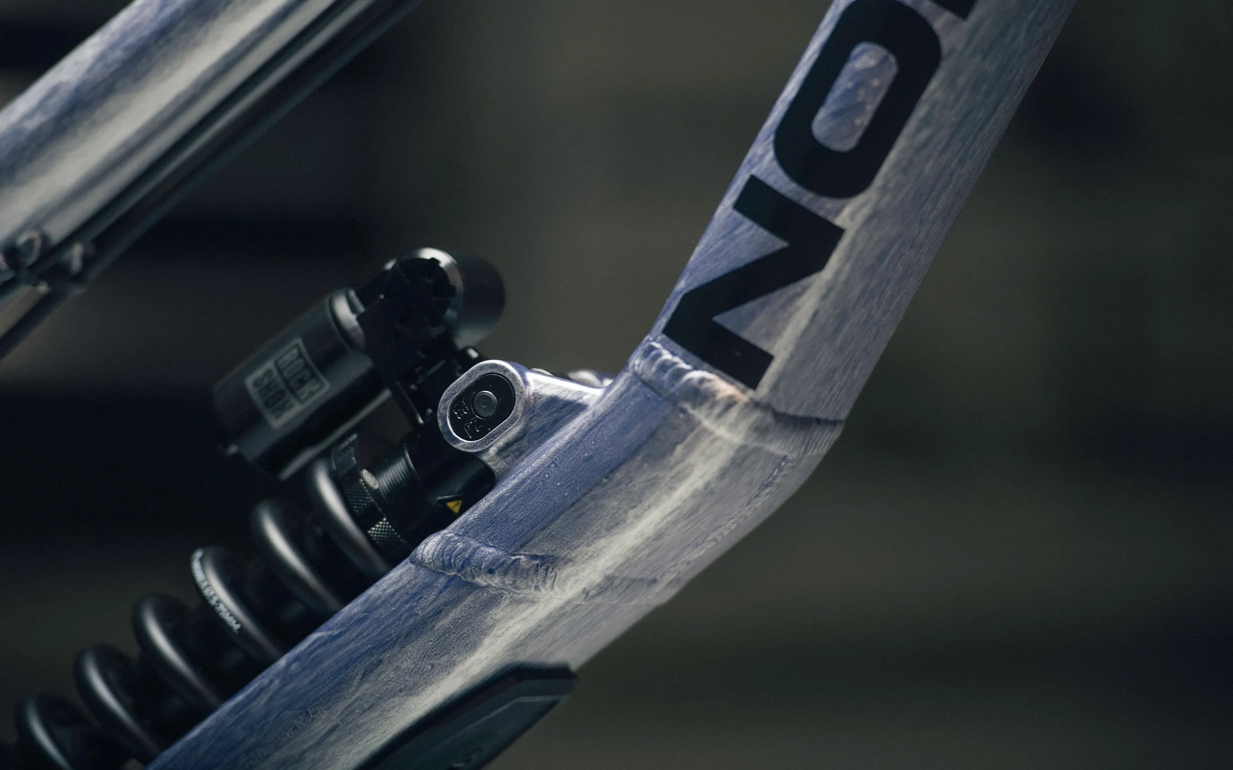 The RockShox coil shock's upper mount on the Team DH's welded alloy frame