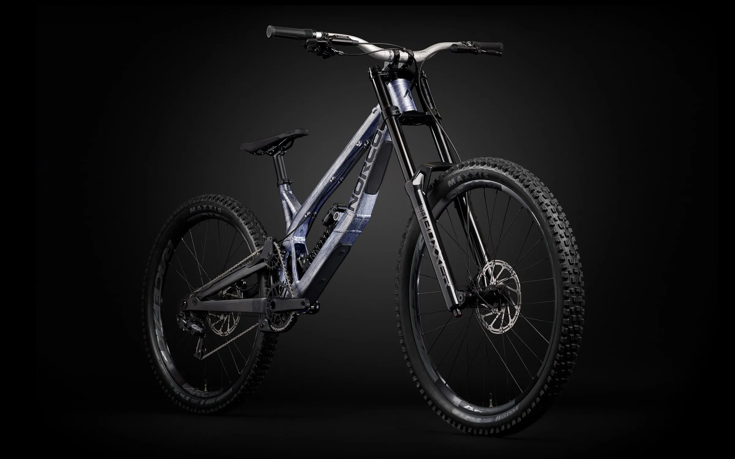 The complete Team DH 2 in silver and blue, seen from the front three-quarter