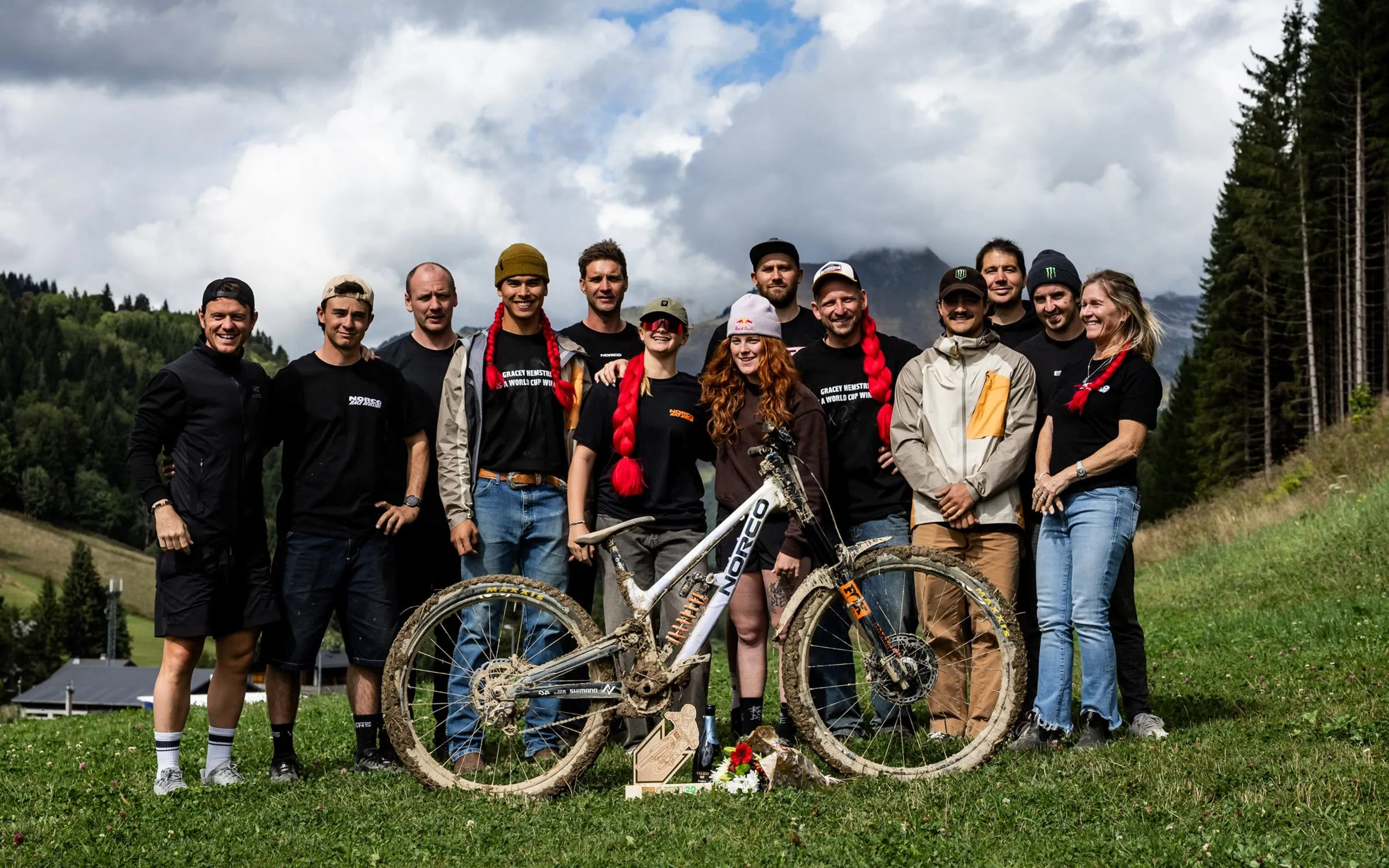 The Norco team gathered around the Team DH at Les Gets