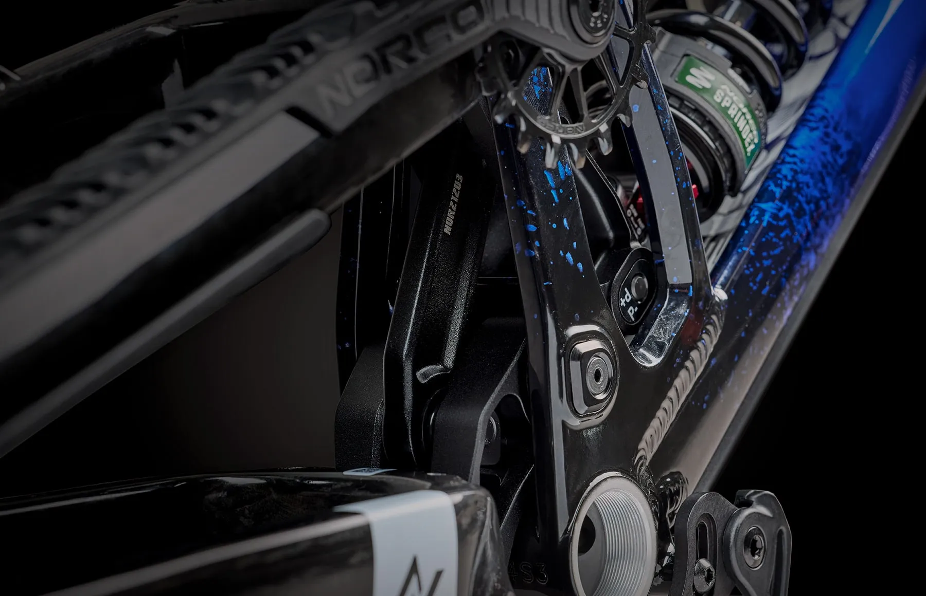 The Team DH's machined HVP-6 linkage, shot close in low workshop light